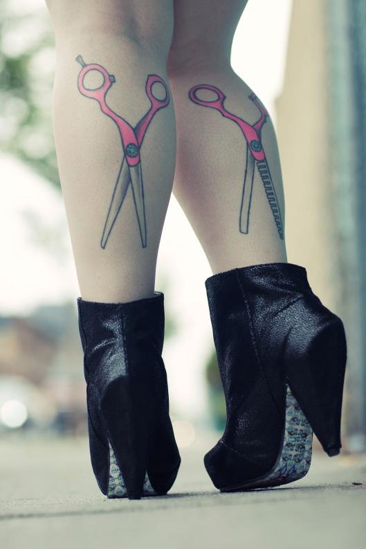 Kristin Jackson's scissor tattoos, now that's commitment to her craft!