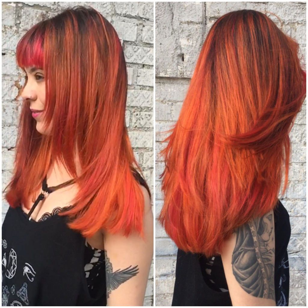 Kristin Jackson did this full balayage in creative colors of orange, red and pink. 