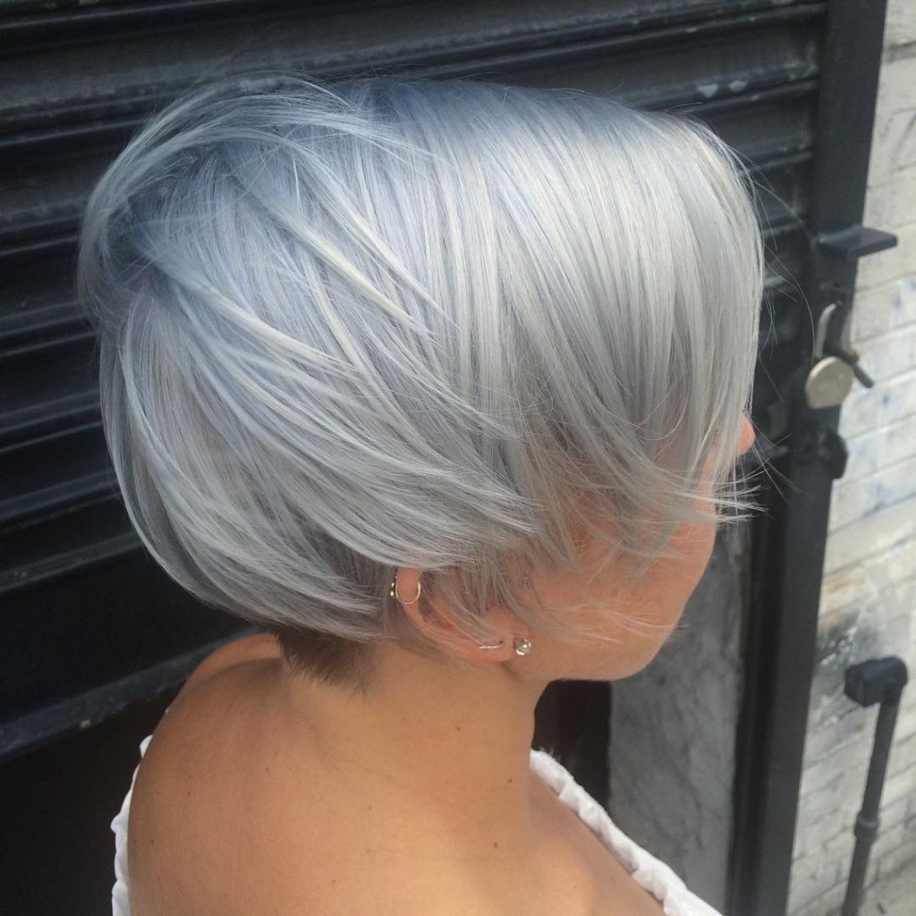 Natalia Michele did an all over double process to achieve this silver white hair. Virgin snow indded